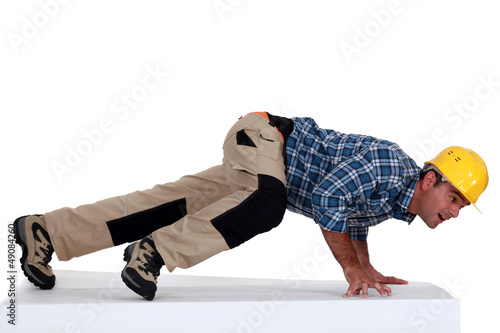 Photo: Builder pushing Builder pushing