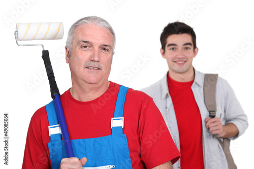Photo: Son helping father decorate Son helping father decorate
