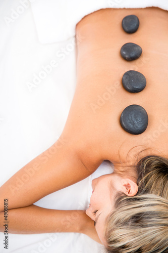 Photo: Woman getting a massage Woman getting a massage
