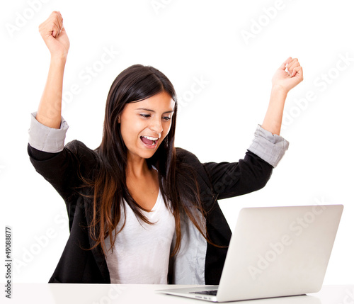 Photo: Successful woman with a laptop Successful woman with a laptop