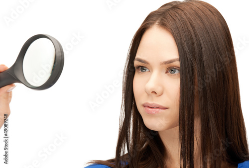Photo: woman with magnifying glass woman with magnifying glass