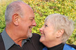 Beautiful senior couple laughing at each other