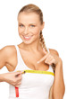 woman measuring her breast