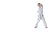 Karate boy exercising isolated against white background