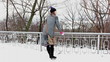 Video: young girl in the winter on the street young girl in the winter on the street