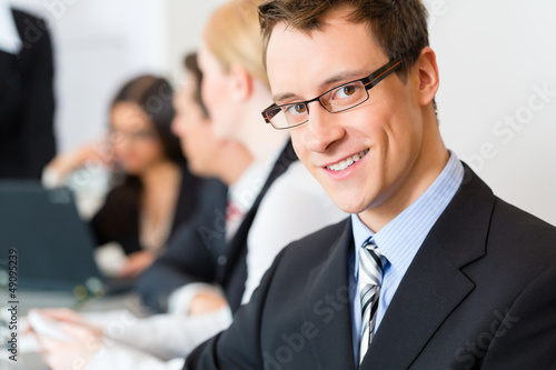 Photo: Business - businesspeople, meeting and presentation in office Business - businesspeople, meeting and presentation in office