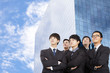 young business team standing before the modern building