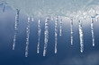 Beautiful icicles against the storm sky