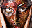 A woman's face in oil paints