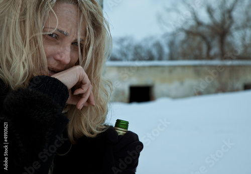 Photo: Homeless frozen woman alcohol bottle Homeless frozen woman alcohol bottle
