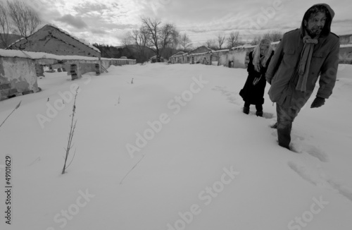 Photo: lost couple walking ruins lost couple walking ruins