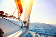 Yacht Sailing against sunset. Sailboat. Yachting. Sailing