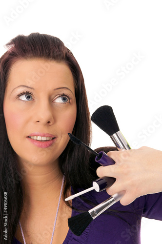 Photo: pretty woman with cosmetic brush pretty woman with cosmetic brush