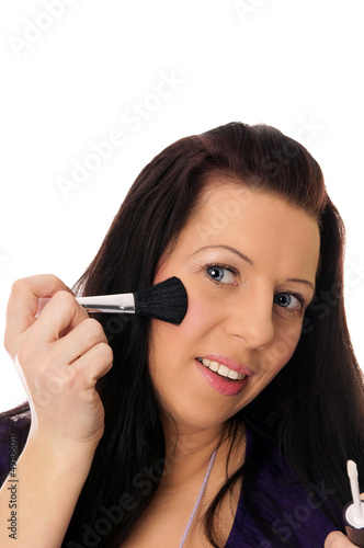 Photo: pretty woman with cosmetic brush pretty woman with cosmetic brush