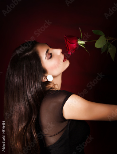 Photo: Woman with red rose Woman with red rose