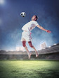 football player striking the ball