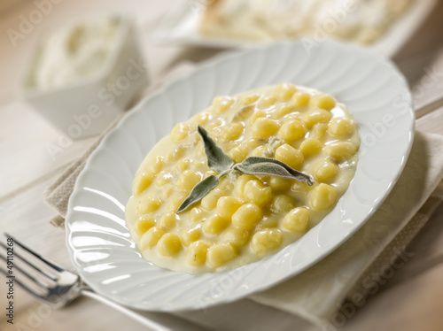 Photo: homemade gnoochi with gorgonzola, selective focus homemade gnoochi with gorgonzola, selective focus