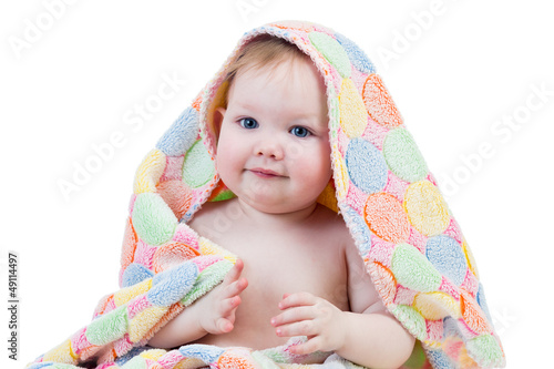 Photo: Adorable happy baby girl in towel Adorable happy baby girl in towel