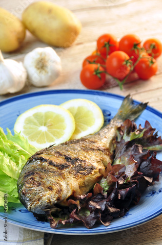Photo: sea bream with salad sea bream with salad