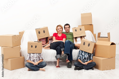 Photo: Happy family with four kids in their new home Happy family with four kids in their new home