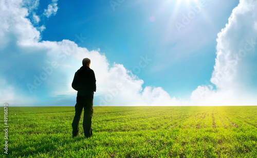 Photo: Man in green meadow Man in green meadow