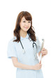 Beautiful young nurse on white background