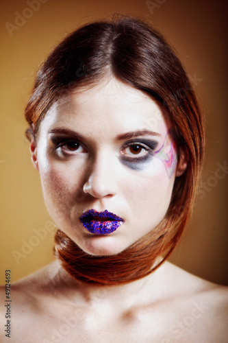 Photo: portrait of young beautiful woman creative make up portrait of young beautiful woman creative make up