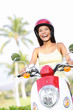 Free woman riding scooter happy