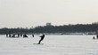 Snow-kiting on a frozen lake