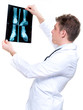 Photo: attractive and expressive doctor holding x-ray attractive and expressive doctor holding x-ray