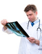attractive male doctor examining foot x-ray