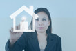 Business Lady pushing Home icon.
