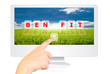 Hand pushing Benefit word on monitor screen.