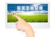 Hand pushing Maximum word on monitor screen.