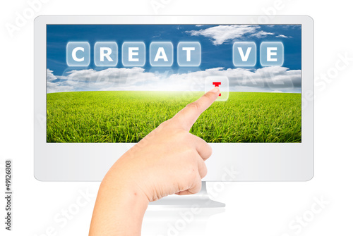 Illustration: Hand pushing Creative word on monitor screen. Hand pushing Creative word on monitor screen.