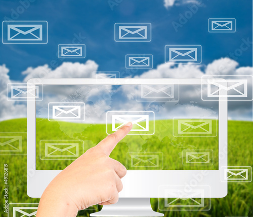 Illustration: Hand pushing Mail on Monitor Screen. Hand pushing Mail on Monitor Screen.