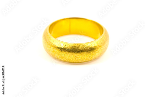 Photo: Close Up Gold ring isolated on the white background. Close Up Gold ring isolated on the white background.
