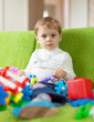 3 years child plays with toys
