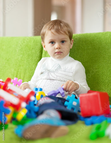 Photo: 3 years child plays with toys 3 years child plays with toys