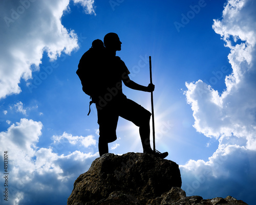 Photo: Man on top of mountain. Man on top of mountain.