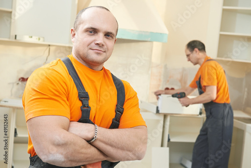 Photo: Portrait of kitchen installation worker Portrait of kitchen installation worker