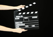 Movie production clapper board isolated on black