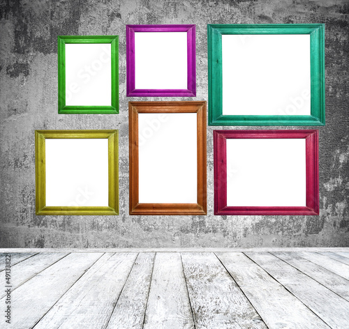 Photo: Empty room with multicolored photo frames Empty room with multicolored photo frames