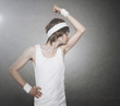 Retro macho nerd kissing his biceps isolated on gray background