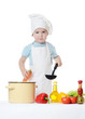 Photo: The little boy in a hat of the cook The little boy in a hat of the cook