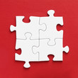 Jig Saw Puzzle - Four White Pieces on Red