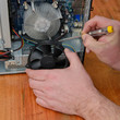 Computer technician repairing a pc