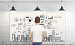 man looking at business scheme
