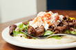 Photo: Side view of Gyro on pita with fork Side view of Gyro on pita with fork
