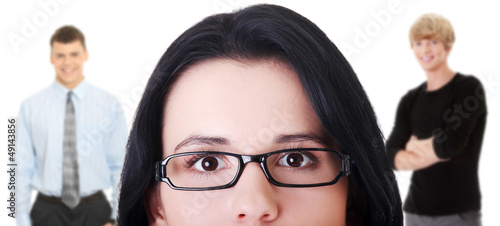 Photo: Young woman trying to choose a boyfriend. Young woman trying to choose a boyfriend.